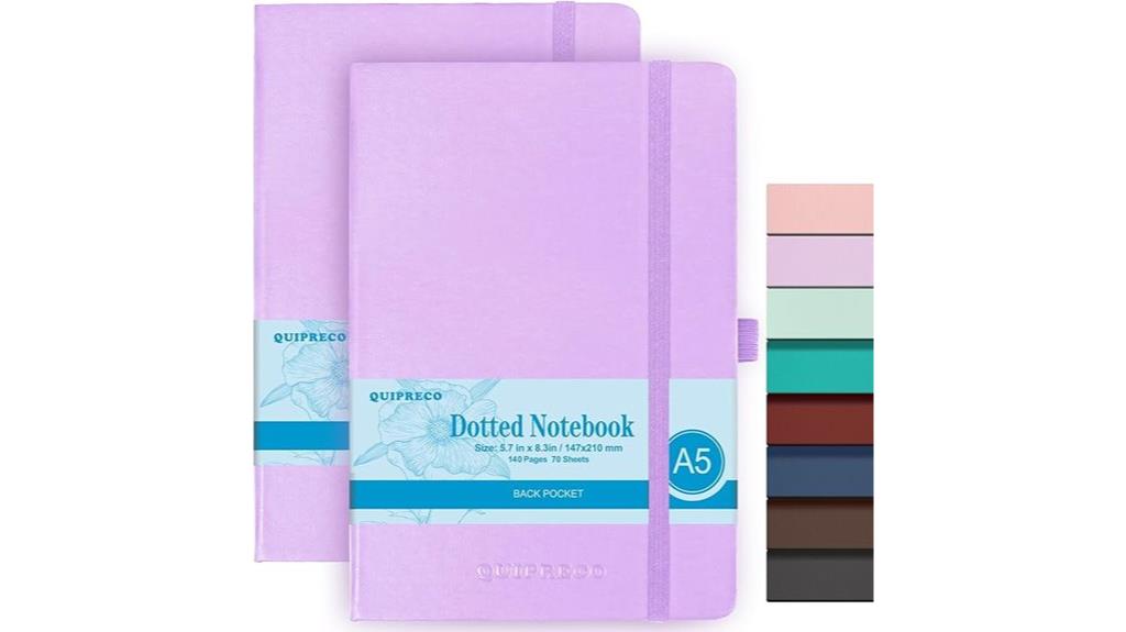 two hardcover bullet journals